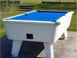 The outdoor pool table with blue baize